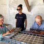 Volunteers sorting artifacts in Portugal 